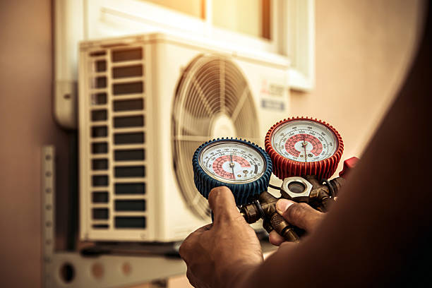 Professional Ac Installation technician working in Patoka, IN
